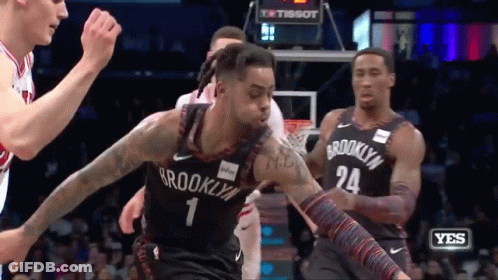 Man In Black Jacket Holding Basketball Thumbs Up GIF