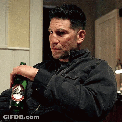 Man In Black Jacket Holding Benjamin Beer GIF