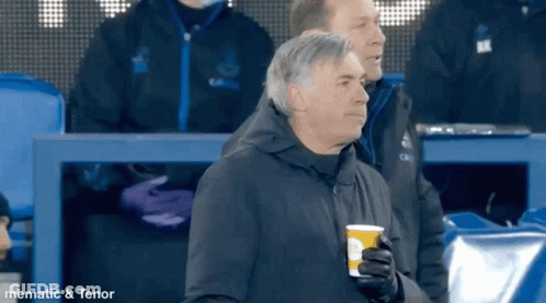 Man In Black Jacket Holding Coffee GIF