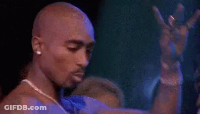 Man In Black Jacket Holding Knife GIF