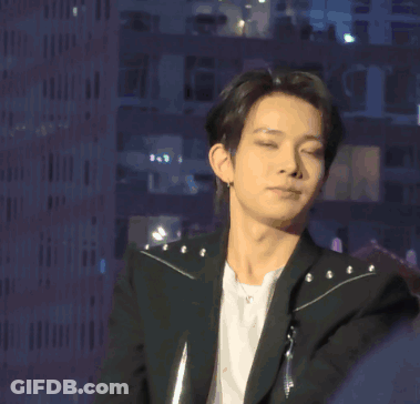 Man In Black Jacket Holding Microphone GIF