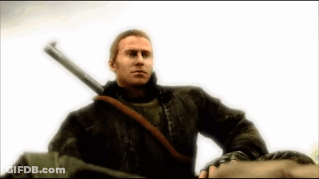 Man In Black Jacket Holding Sword GIF