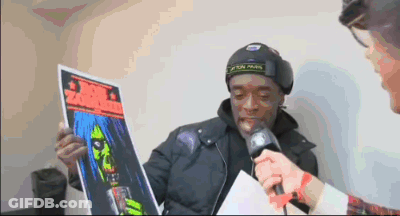 Man In Black Jacket Holding Zombie Poster GIF