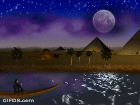 Man In Black Jacket In Front Of Pyramid GIF