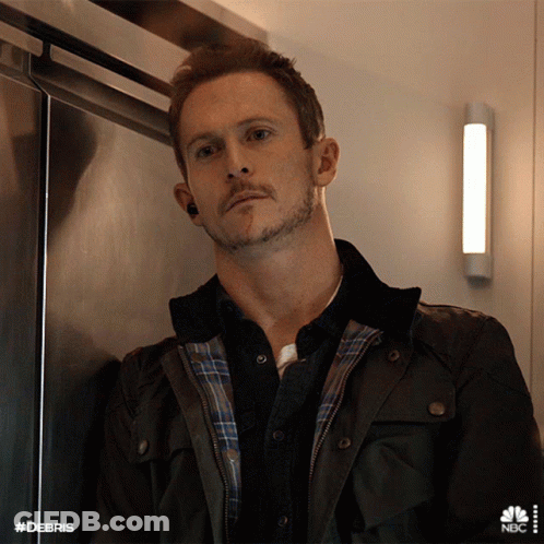 Man In Black Jacket Leaning Against Wall #Debris GIF