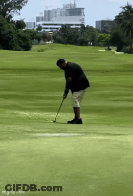 Man In Black Jacket Playing Golf GIF