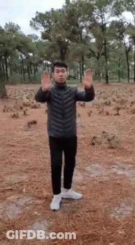 Man In Black Jacket Raising Hands GIF