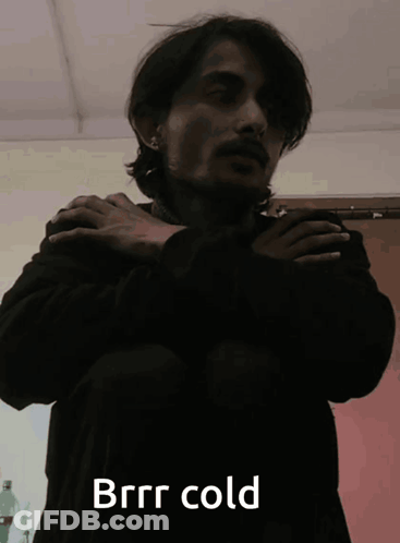 Man In Black Jacket Saying Brrr Cold GIF