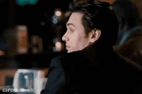 Man In Black Jacket Saying Hey Trouble GIF