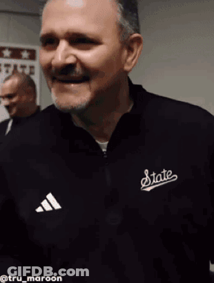 Man In Black Jacket Saying State GIF