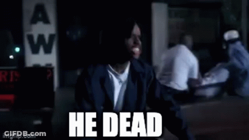 Man In Black Jacket Sitting Beside He Dead Building GIF