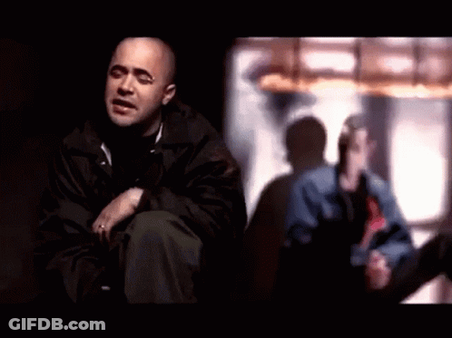 Man In Black Jacket Sitting By Window GIF