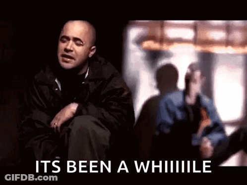 Man In Black Jacket Sitting By Window GIF