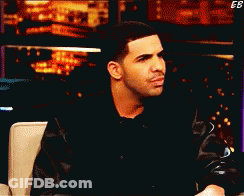 Man In Black Jacket Sitting With EB Letters GIF