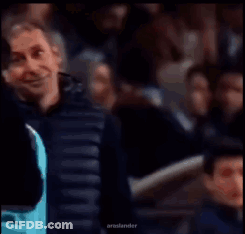 Man In Black Jacket Smiling At Crowd Arashlander GIF