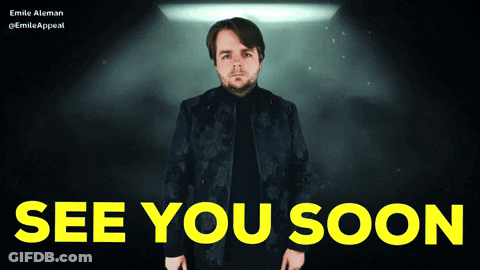 Man In Black Jacket Standing Before See You Soon Sign GIF
