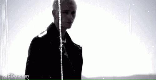 Man In Black Jacket Standing In Rain GIF