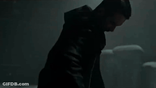 Man In Black Jacket Standing In Snow GIF