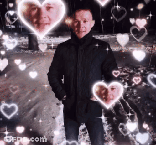 Man In Black Jacket Surrounded By Hearts And Stars GIF
