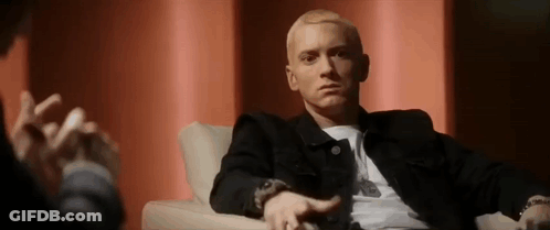 Man In Black Jacket Talking To Man GIF