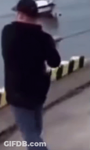 Man In Black Jacket Walking GIF