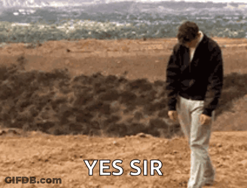Man In Black Jacket Walking Saying Yes Sir GIF