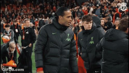 Man In Black Jacket With AXA GIF