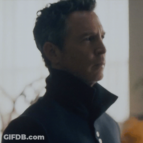 Man In Black Jacket With Collar Buttons GIF