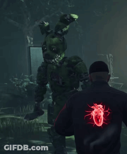 Man In Black Jacket With Heart On Back GIF