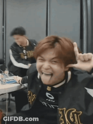 Man In Black Jacket With Letter G GIF