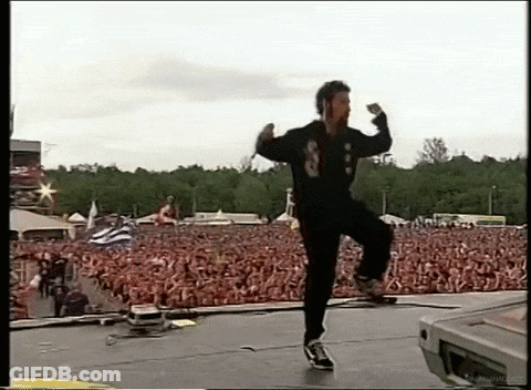 Man In Black Jacket With Number 8 Dancing On Stage GIF
