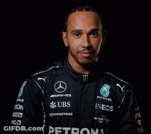 Man In Black Jacket With UBS And Ineos Sponsors GIF