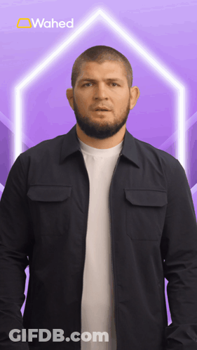 Man In Black Jacket With Wahed On Purple Background GIF