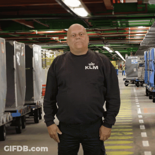 Man In Black KLM Sweatshirt Warehouse GIF