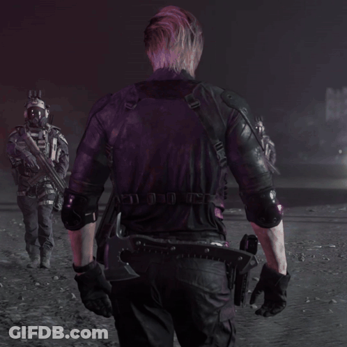 Man In Black Leather Jacket Holding Gun GIF