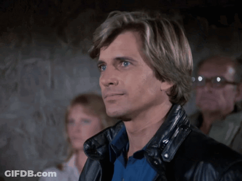 Man In Black Leather Jacket Looking Aside GIF