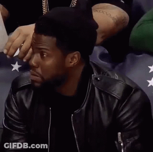 Man In Black Leather Jacket Sitting In Stadium Alright Then GIF
