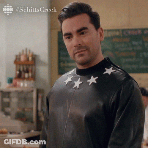 Man In Black Leather Jacket With Three White Stars GIF