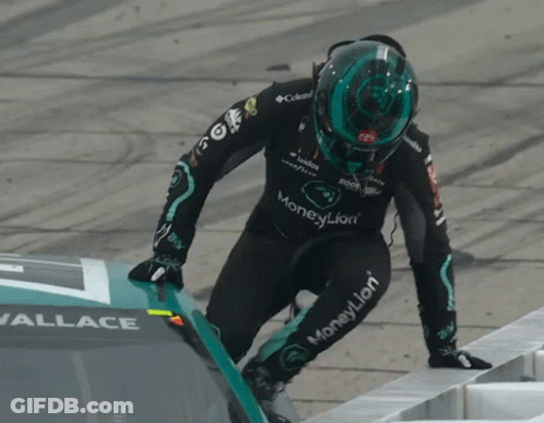 Man In Black Logitech Shirt Talking To Two Men GIF