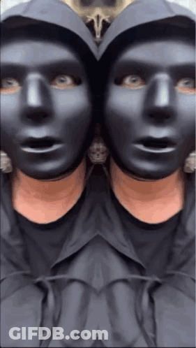 Man In Black Mask And Hood GIF