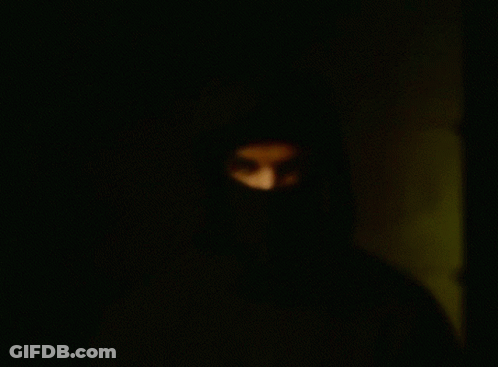 Man In Black Mask Close Up GIF