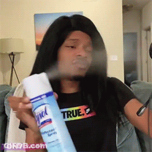 Man In Black Mask Holding Air Freshener GIF
