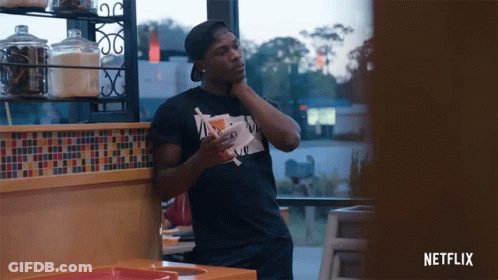 Man In Black Netflix T-Shirt GIF