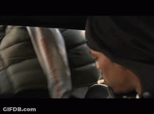 Man In Black Nike Hat Looking Down GIF
