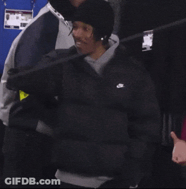 Man In Black Nike Jacket And Beanie GIF