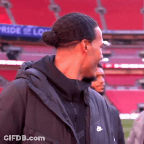 Man In Black Nike Jacket At Stadium GIF