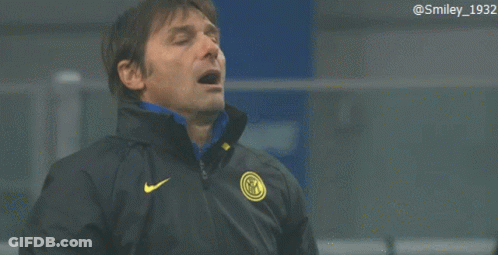 Man In Black Nike Jacket With Yellow Logo GIF