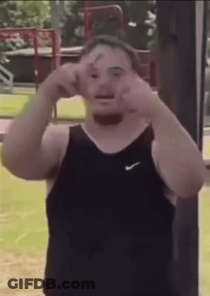 Man In Black Nike Tank Top Making Face GIF