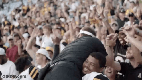 Man In Black Number 3 Jersey Hugging Another Man In Stadium GIF