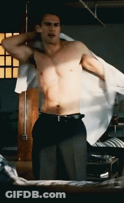 Man In Black Pants And White Shirt Standing On Bed GIF
